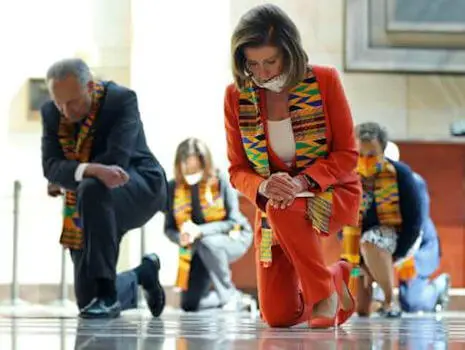 Nancy Pelosi wearing Kente cloth