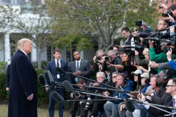 Donald Trump speaks to media reporters
