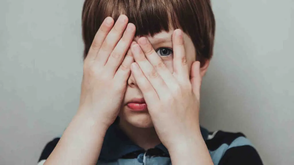 Child Hiding eyes