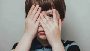 Child Hiding eyes